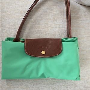 Large size green Longchamp Le Pilage Tote.